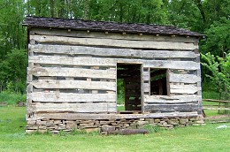 The Log House is reassembled.